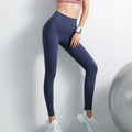 Sports leggings with pockets for women in chemical fibre blend polyester and spandex, available in navy black purple blue sizes S M L XL, suitable for body building across all seasons