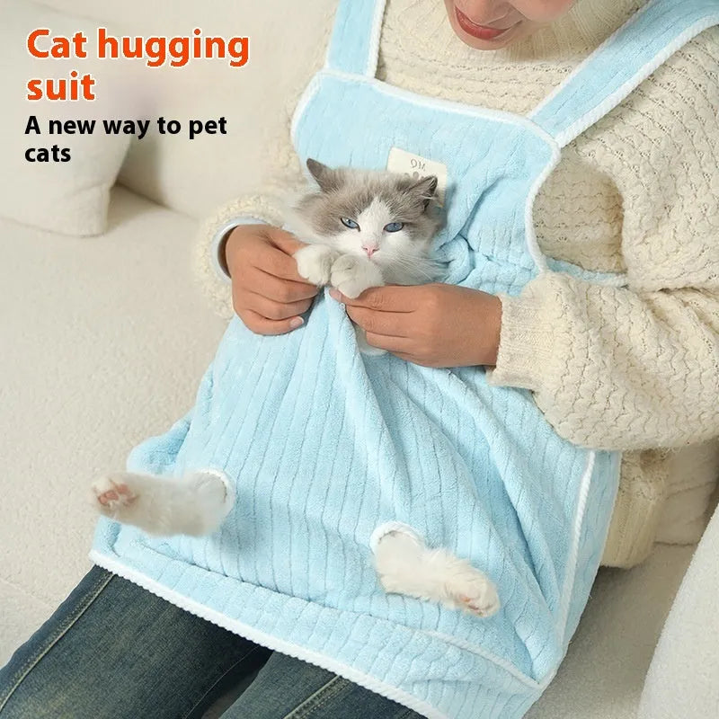 Cloth cat grooming apron in light blue with ventilation holes for breathability during petting