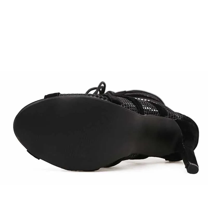 Black suede women's lace-up high heel shoes on a 11.5 cm heel.