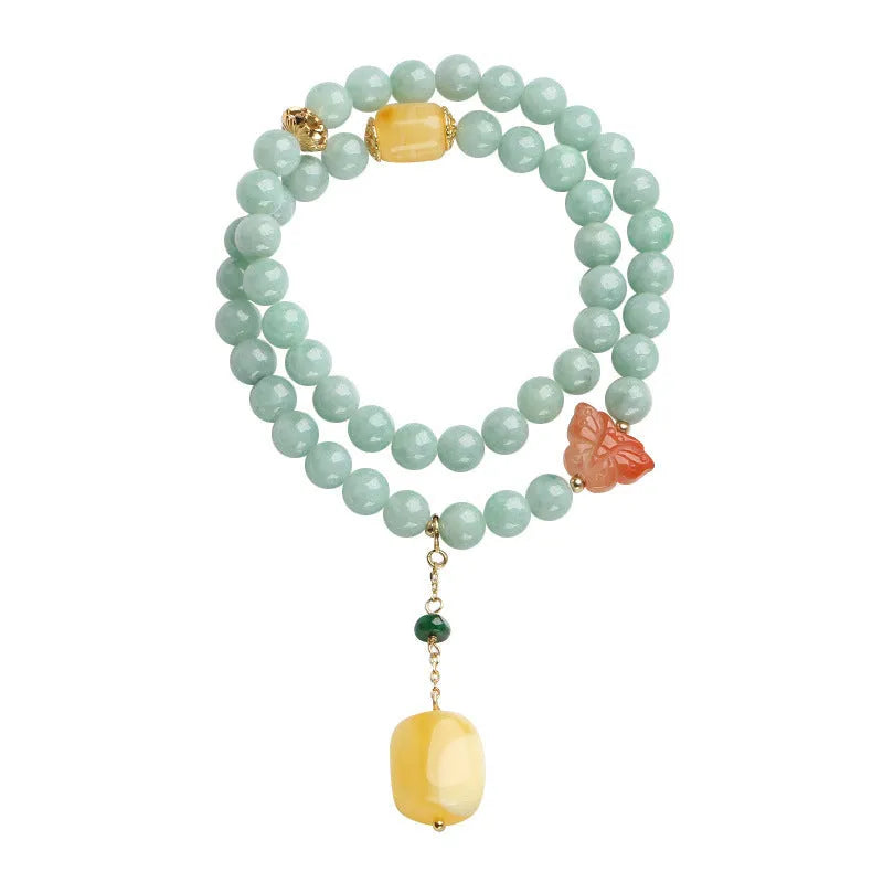 Close-up of a double-layer women's bracelet with green jade round beads and brown beeswax barrel beads in a geometric design.