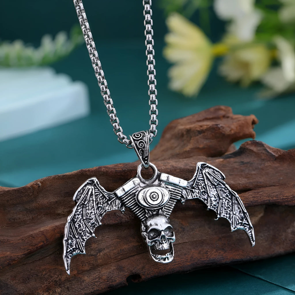 Gothic dark skull alloy necklace with skeleton wing pendant on display