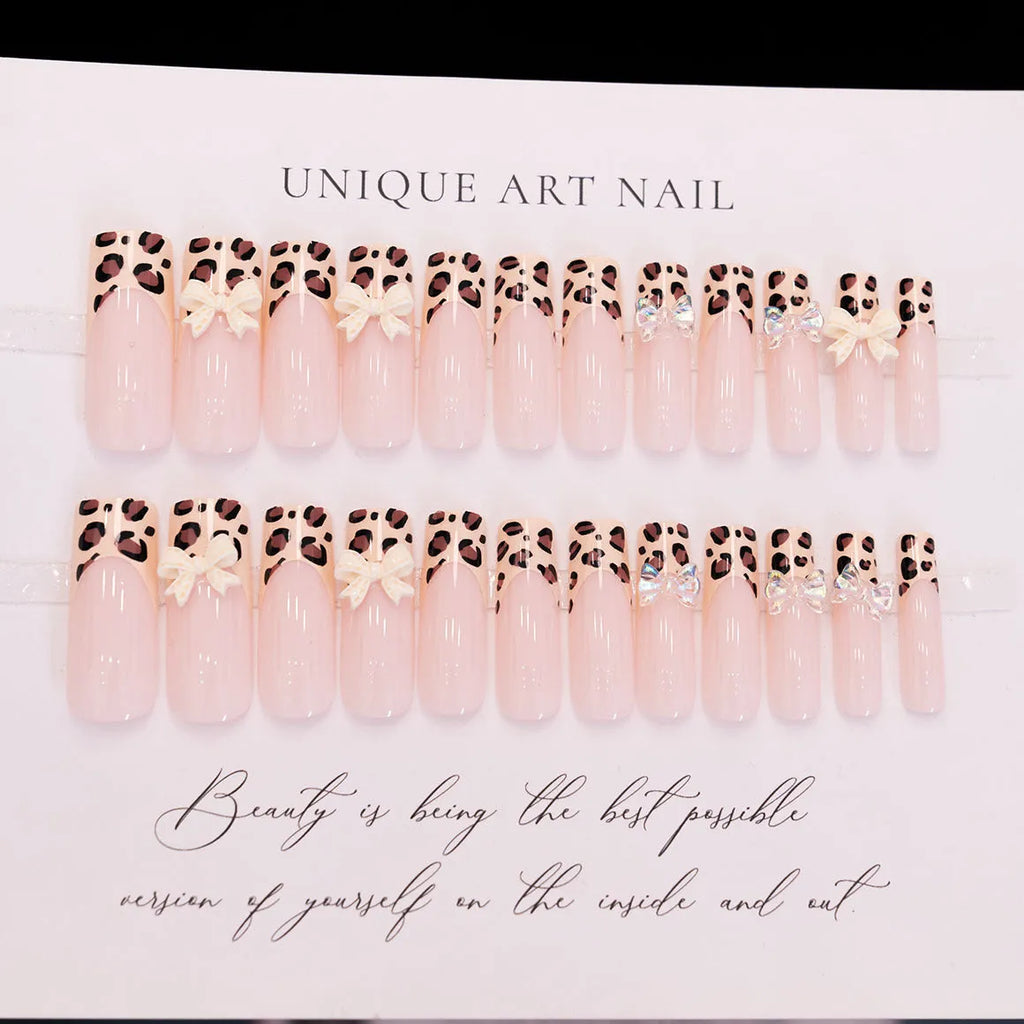 Leopard print butterfly nail art kit with plastic decorative tips in colour WM296