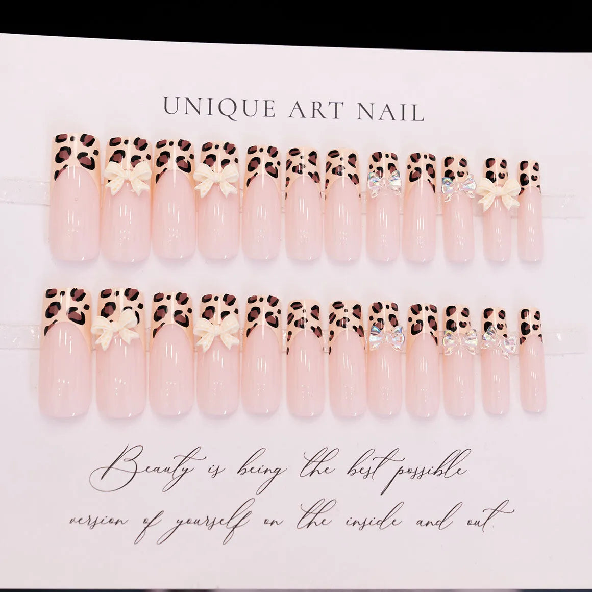 Leopard print butterfly nail art kit with plastic decorative tips in colour WM296