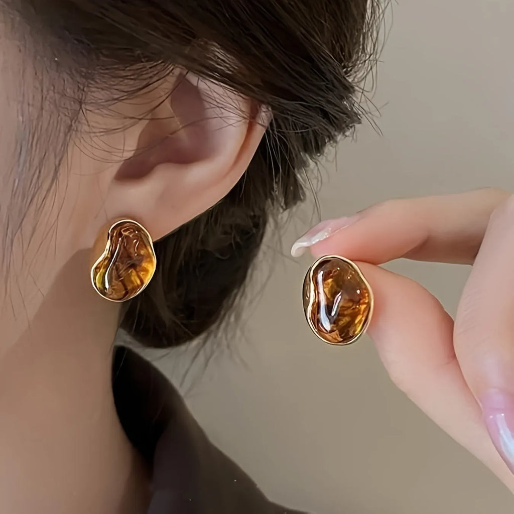 Women's geometric holiday earrings in alloy with electroplated finish and tassel elements
