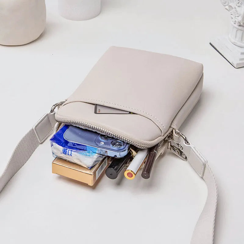 Solid colour mobile phone crossbody shoulder bag in PU material showing front view