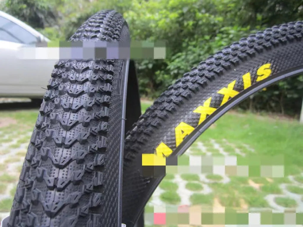 Mountain bike ultralight puncture-resistant tyre showing tread pattern and sidewall with size options