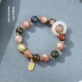 Hand-woven fragrant grey coloured glaze bracelet with sunstone or white lip shell beads