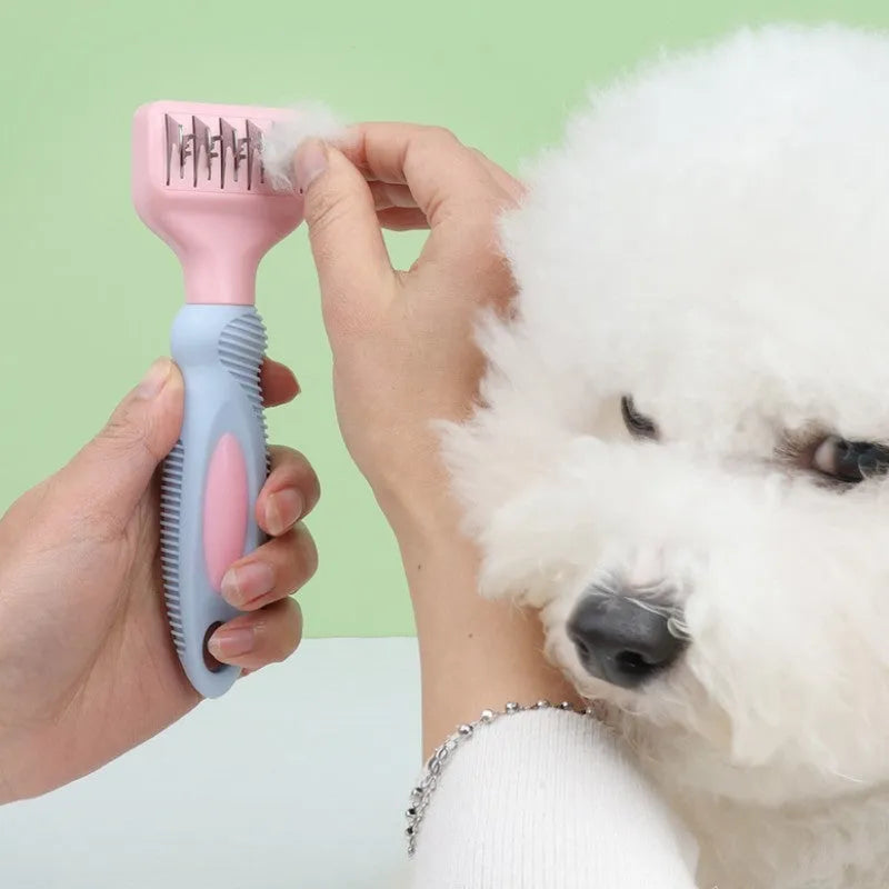 Stainless steel pet grooming comb with pink rubber handle for dogs and cats