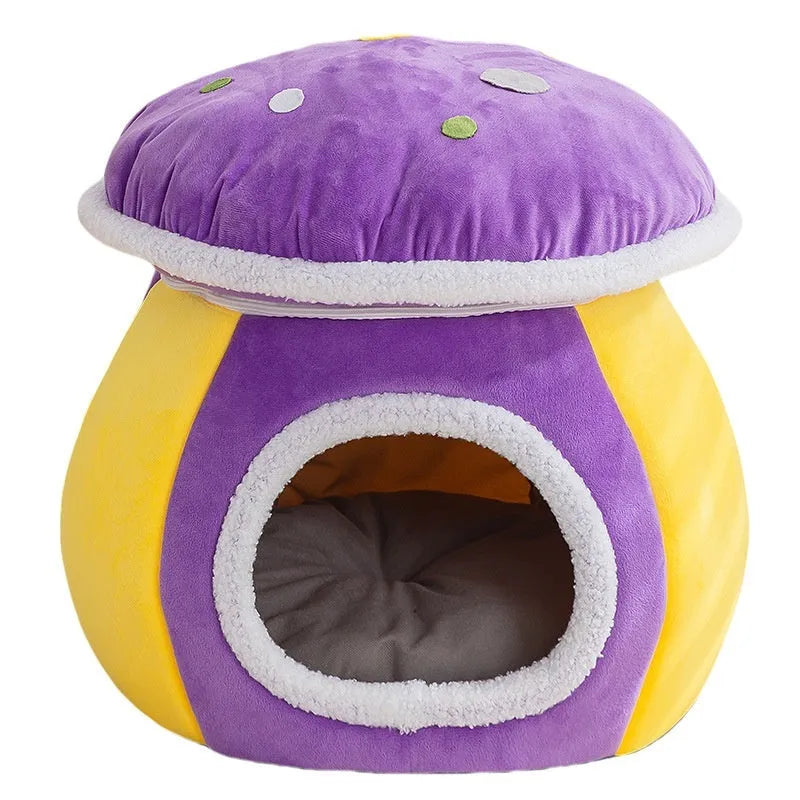 Grey mushroom-shaped plush cat bed with an entrance hole, shown on a wooden floor.