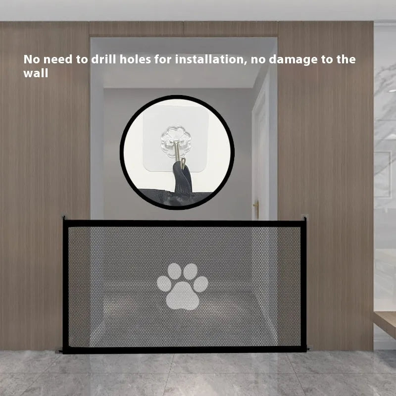 Portable folding dog barrier with plastic rod framework and cloth mesh in doorway with paw print pet doorsill