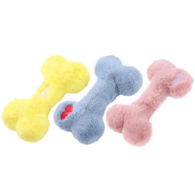 Blue squeaky plush love bone dog toy on a white background