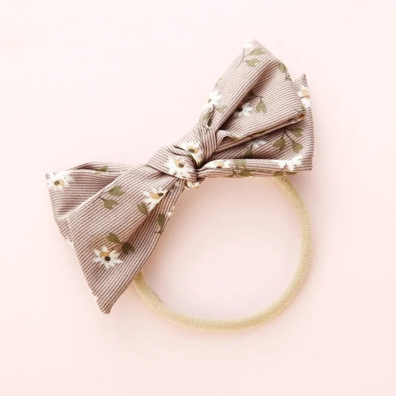 Children's fabric hair band with bow shape and Snow White princess print design