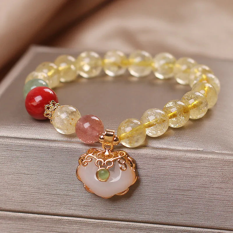 Women's citrine jade ruyi pendant bracelet with yellow crystal detail on alloy metal