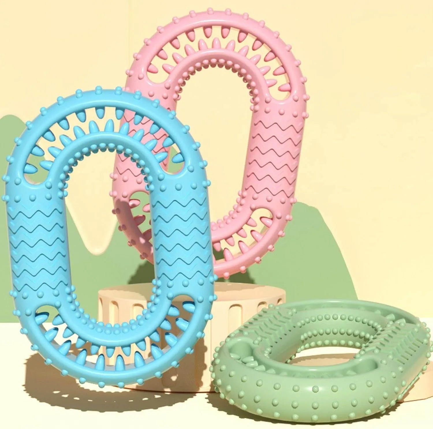 Blue O-ring shaped dog dental chew toy for aggressive chewers measuring 12.5cm by 8.6cm