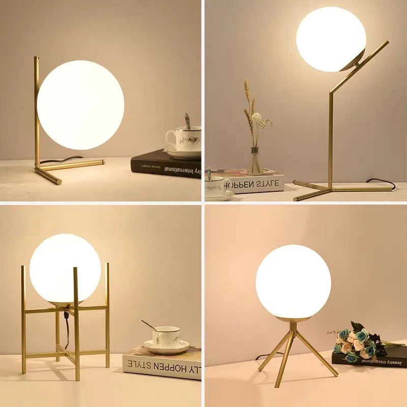 Creative glass desk lamp with three-tone LED lighting on a wooden desk.