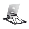 Black card phone holder bracket measuring 8.5cm by 5cm on desktop
