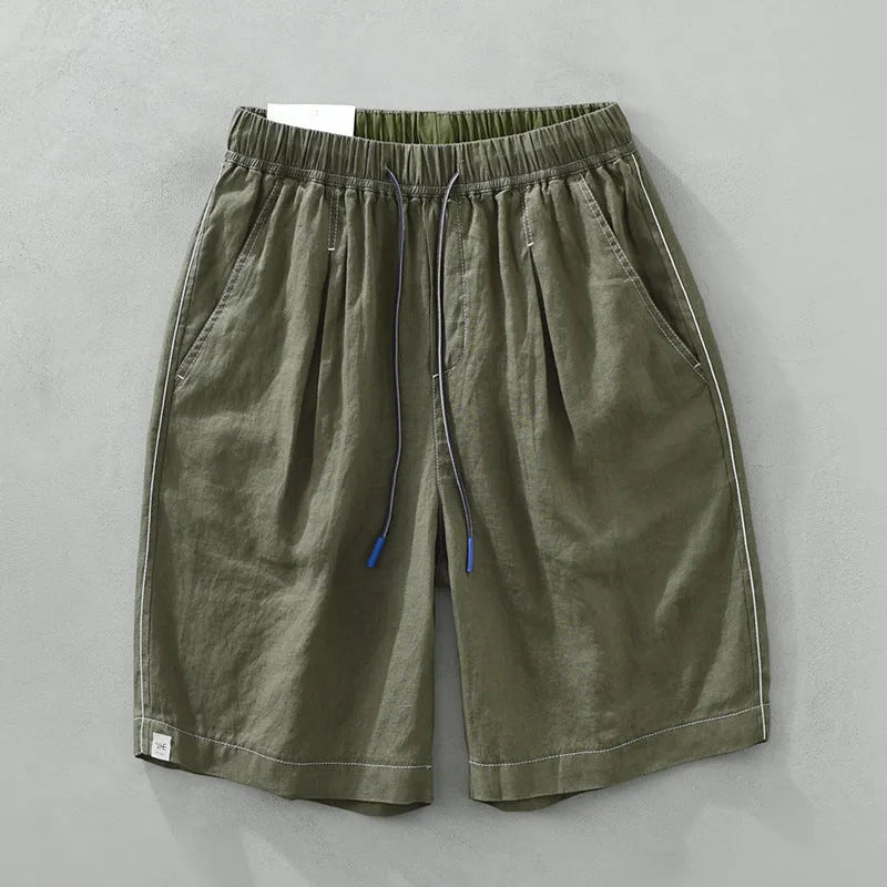 Men's linen shorts in straight drooping style with drawstring waist, shown in green and black colour options