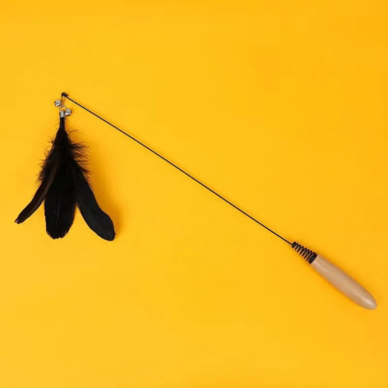 Wooden handle cat teasing stick with feather and bell attachment in one of four colour options