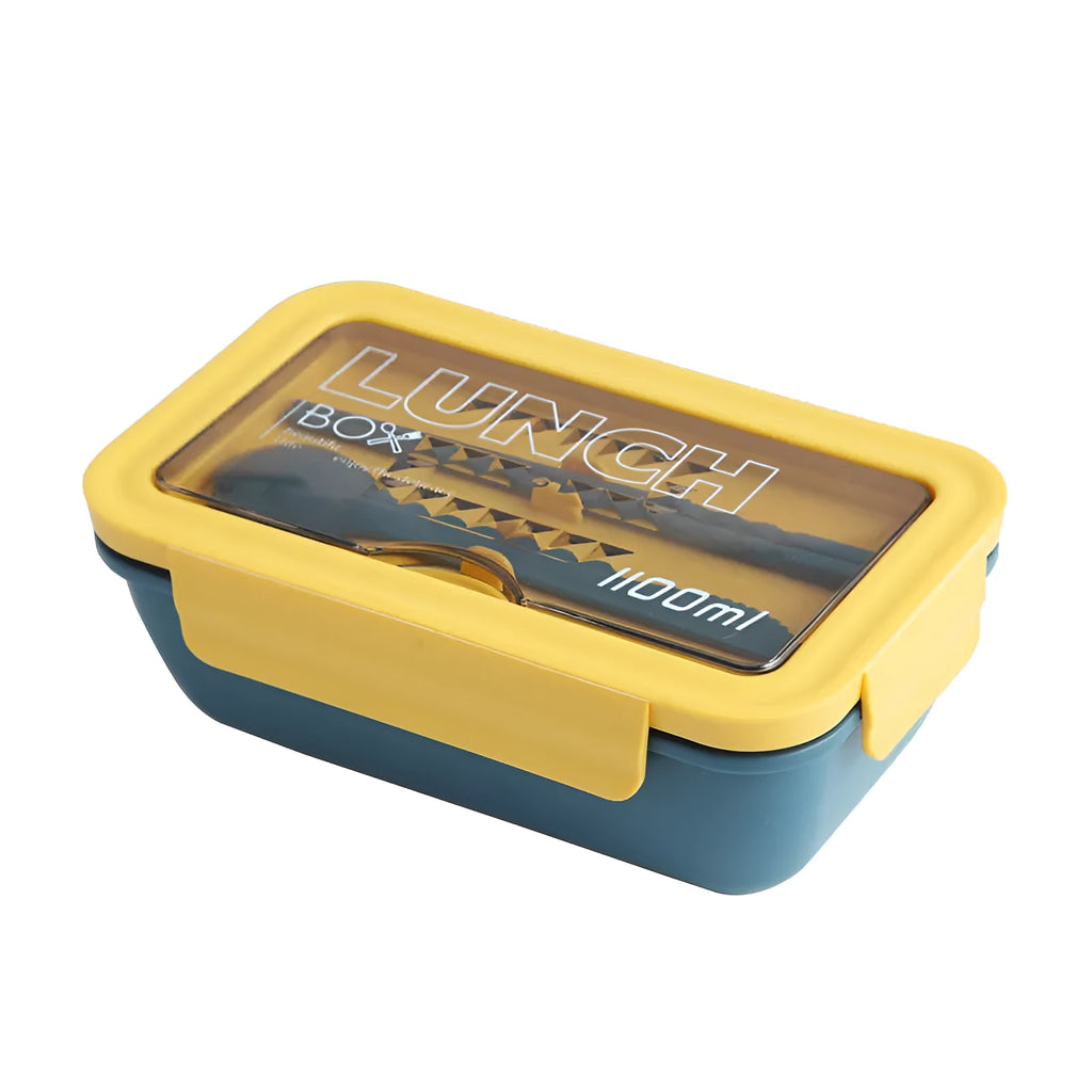 Green plastic bento lunch box with four food compartments showing Nordic design