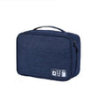 Blue cationic fabric electronics organiser bag with compartments for cables and headsets.