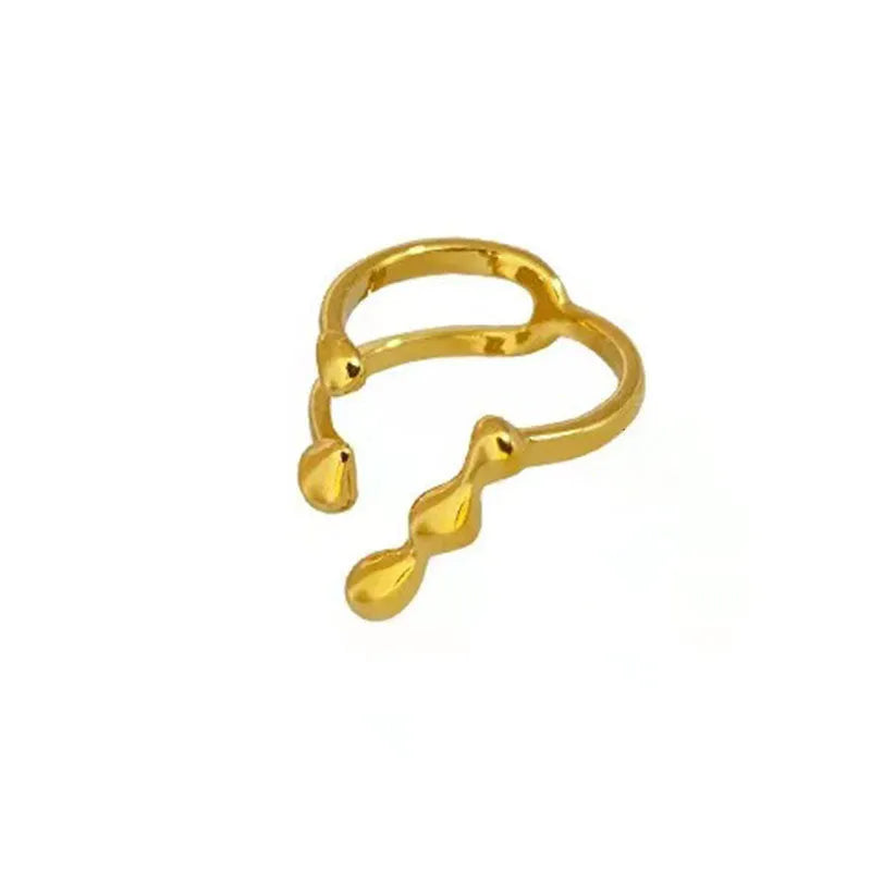 Brass fashion ring with spherical elements in circular design available in gold and silver colours