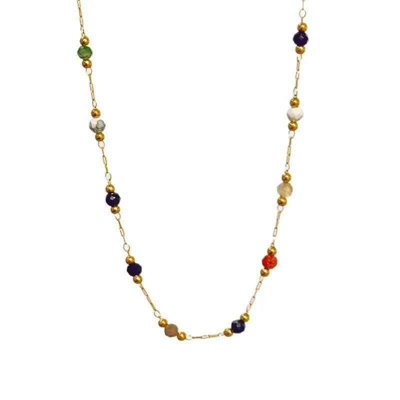 Gold titanium steel necklace with a natural stone pendant on an O-ring chain.