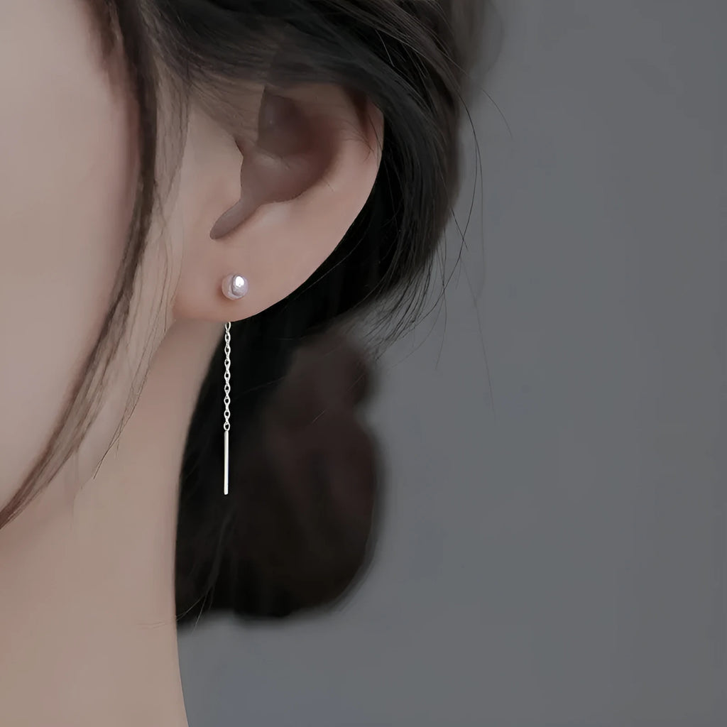 Sterling silver needle ear strings with hanging pearl and geometric designs for female wearers