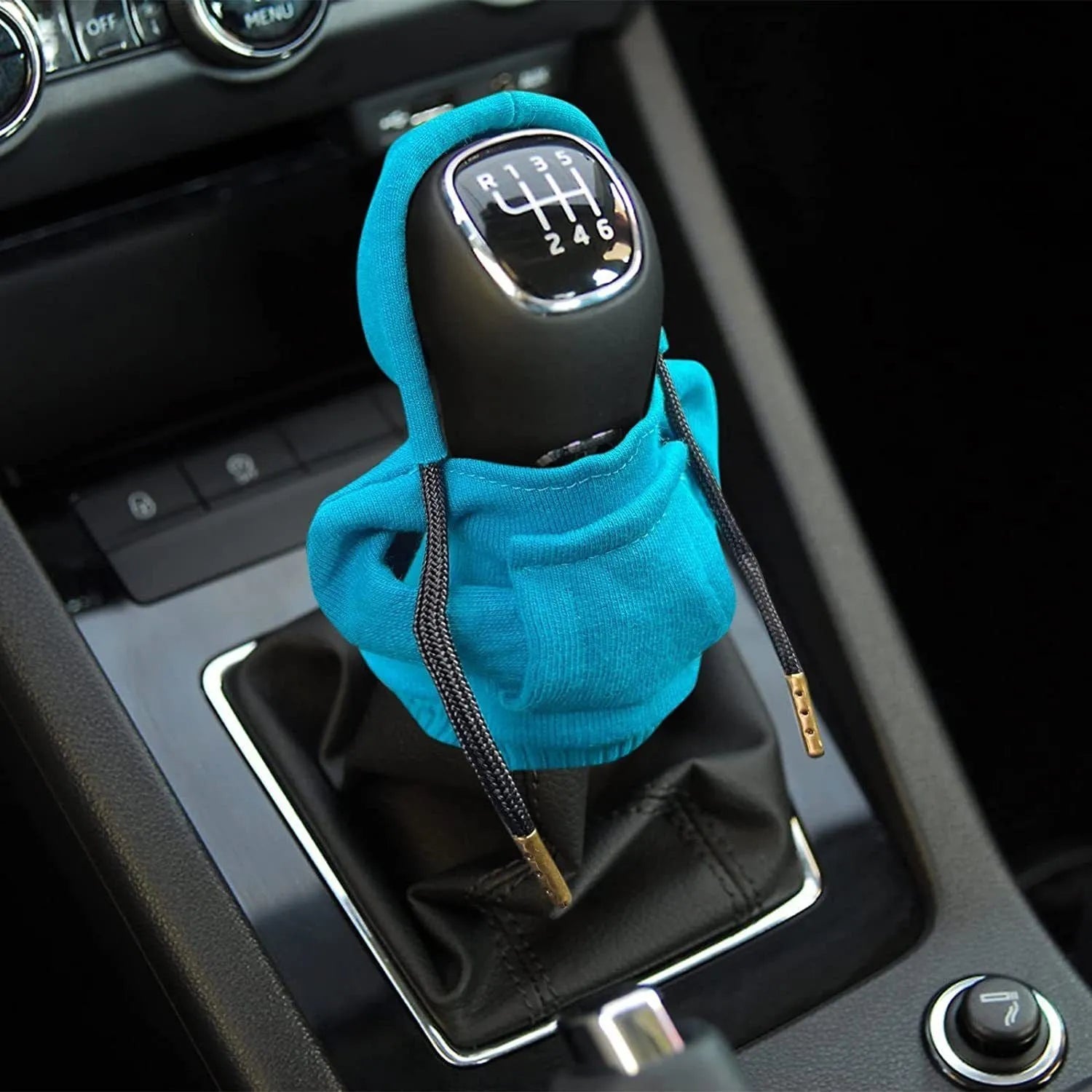 Blue cloth gear shift knob cover fitted on a car's manual gear lever, showing the 13cm by 8cm size.