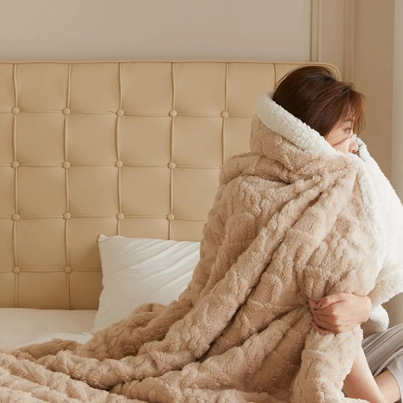 Polyester thermal flannel blanket in tea green colour on a double bed, showing 180x200cm size.