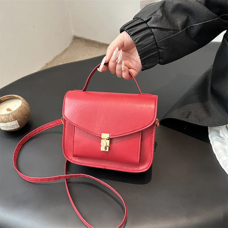 Retro style horizontal square messenger bag in PU material with crossbody strap and document compartment
