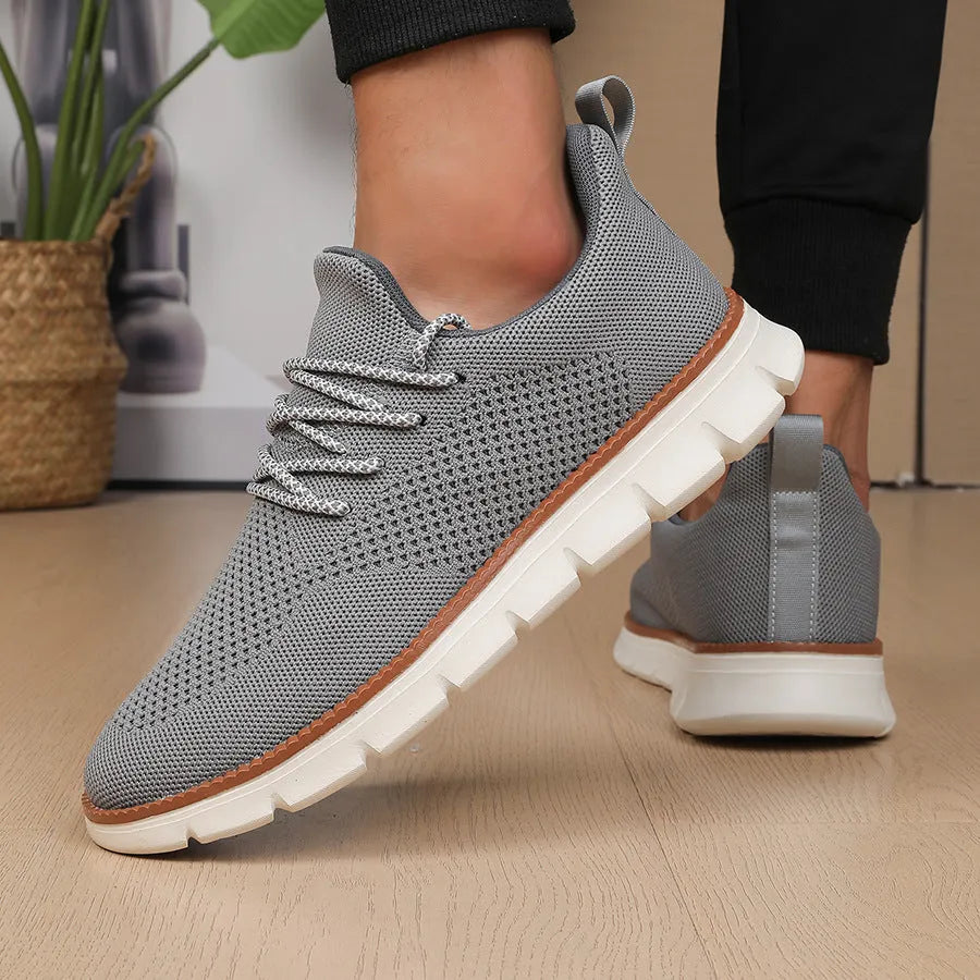 Men's grey and black casual sneakers with mesh fabric upper and round toe design