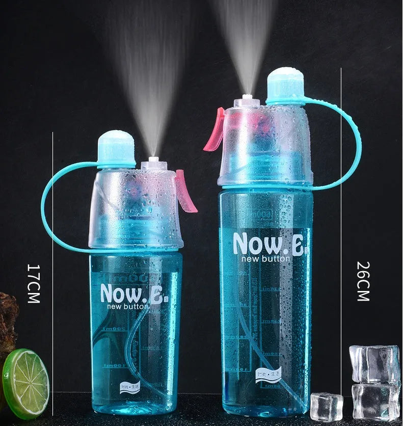 Portable outdoor sports mist spray cup with handle, transparent body showing scale markings, and spray mouth