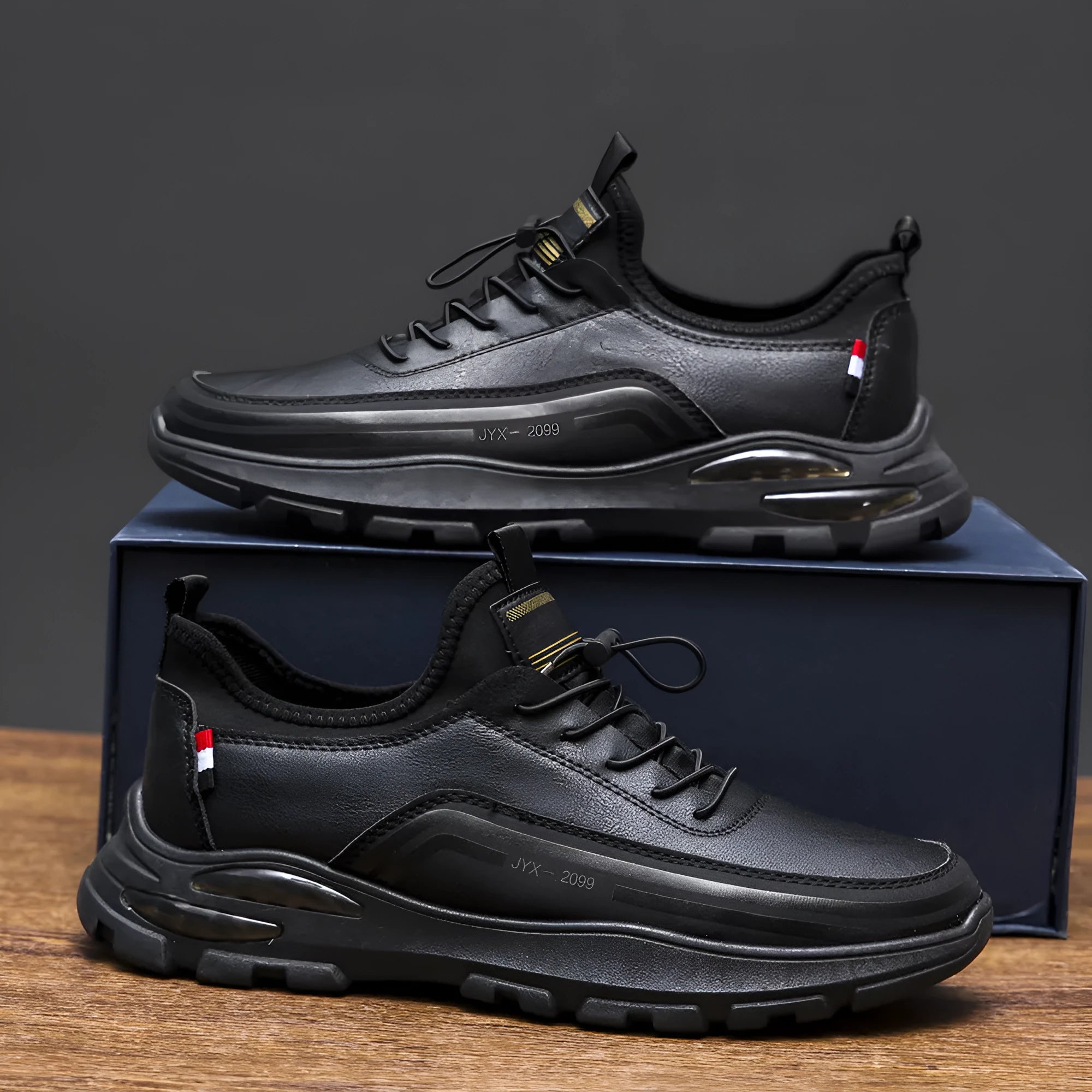 Men's black fleece lined waterproof sneakers with synthetic leather upper and flat rubber sole