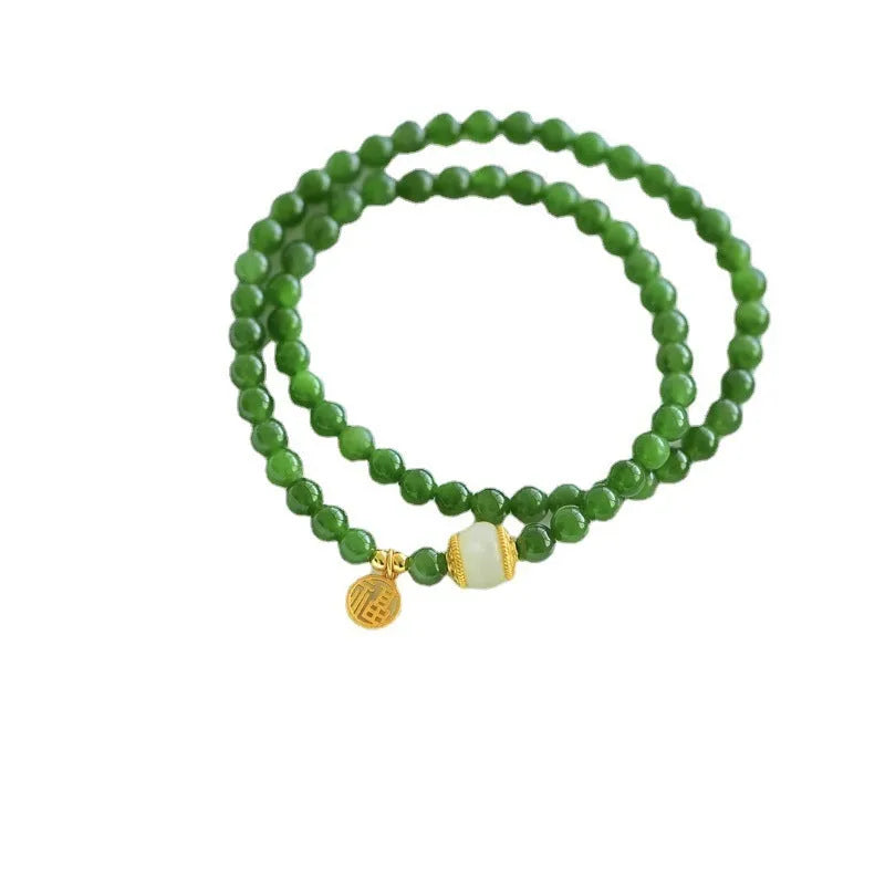 Women's double circle Hetian jade bracelet with engraved fu character in geometric design