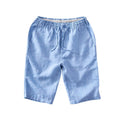 Men's loose-fit linen capri pants in a straight-leg style on a neutral background.