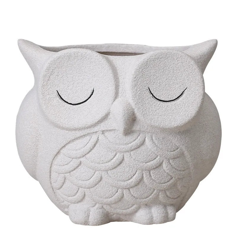 Ceramic succulent flower pot with frosted cartoon owl design measuring 11cm high by 9cm wide