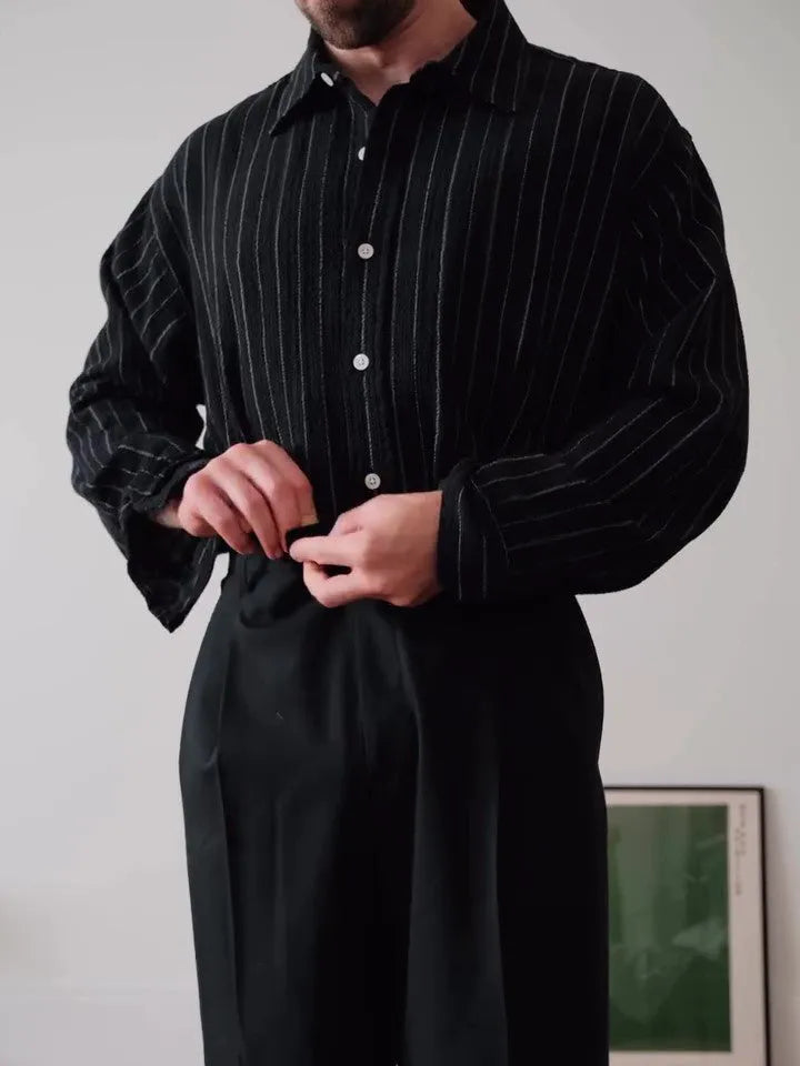 Black pinstriped button-down polyester shirt with regular fit on mannequin