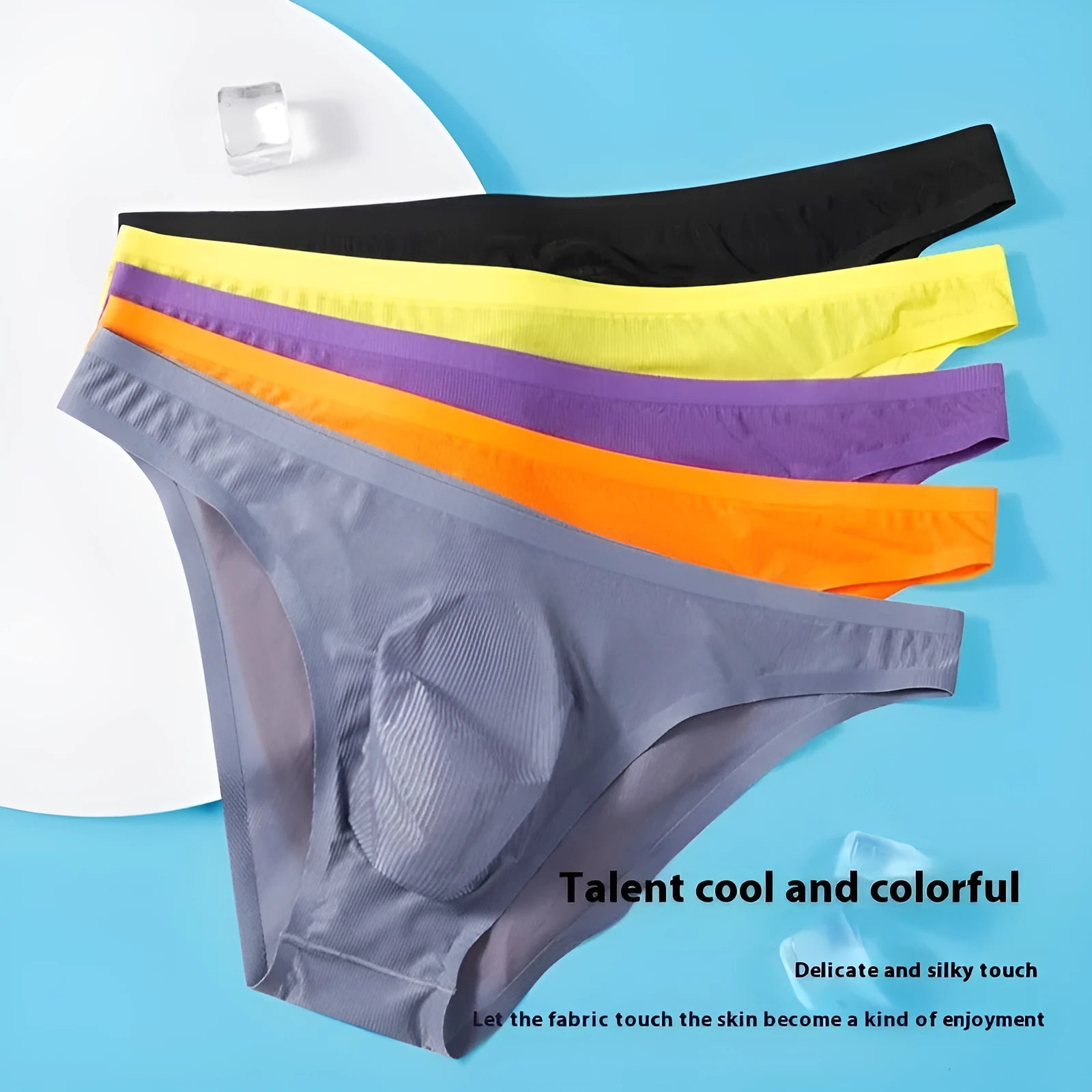 Translucent ice silk men's seamless briefs in striped patterns showing low waist design