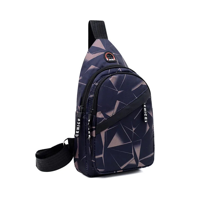 Medium blue crossbody chest bag for men with a visible earphone hole and zipper opening.