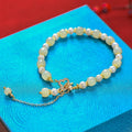 Women's Hetian jade bracelet with gold electroplated chain and pendant in Chinese style
