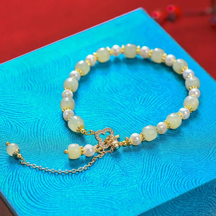 Women's Hetian jade bracelet with gold electroplated chain and pendant in Chinese style