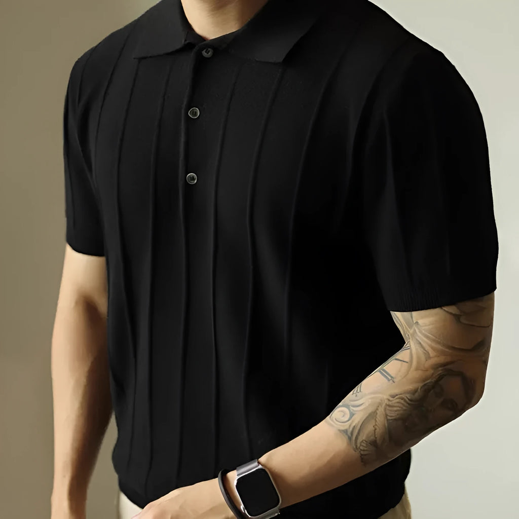 Men's solid black loose fit t-shirt on a hanger