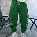 Men's loose fit cropped sports trousers in bamboo fibre, shown in army green.