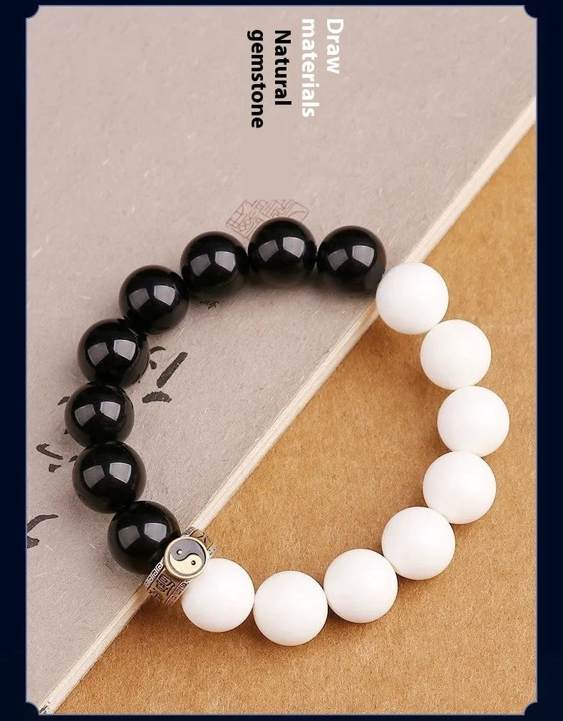 Black and white obsidian bodhi seed taiji bracelet with geometric beads and mantra engraving
