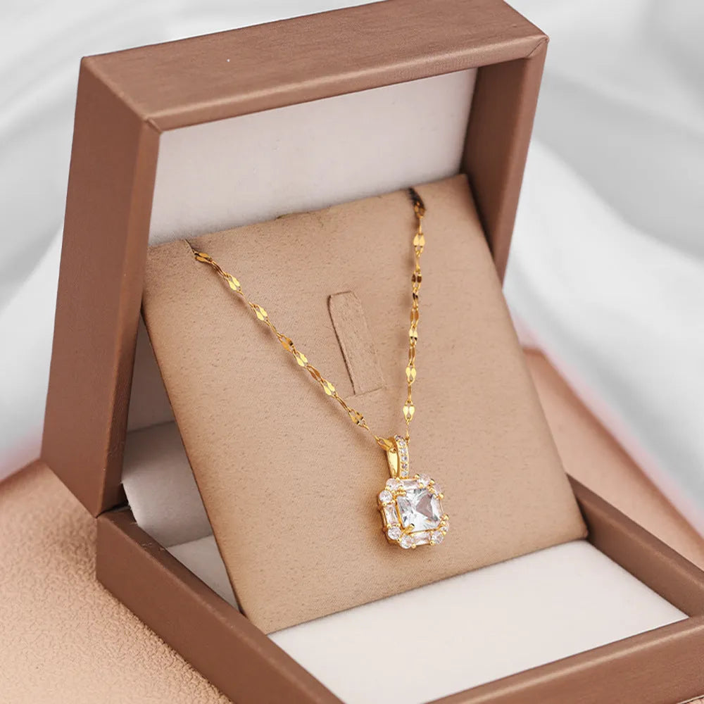 Women's titanium steel geometric pendant necklace with mixed gem inlay on water wave chain