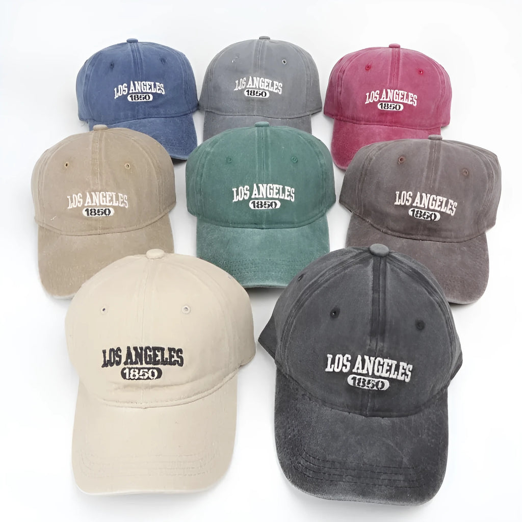 Retro personalised peaked cap with embroidered letters on washed distressed fabric