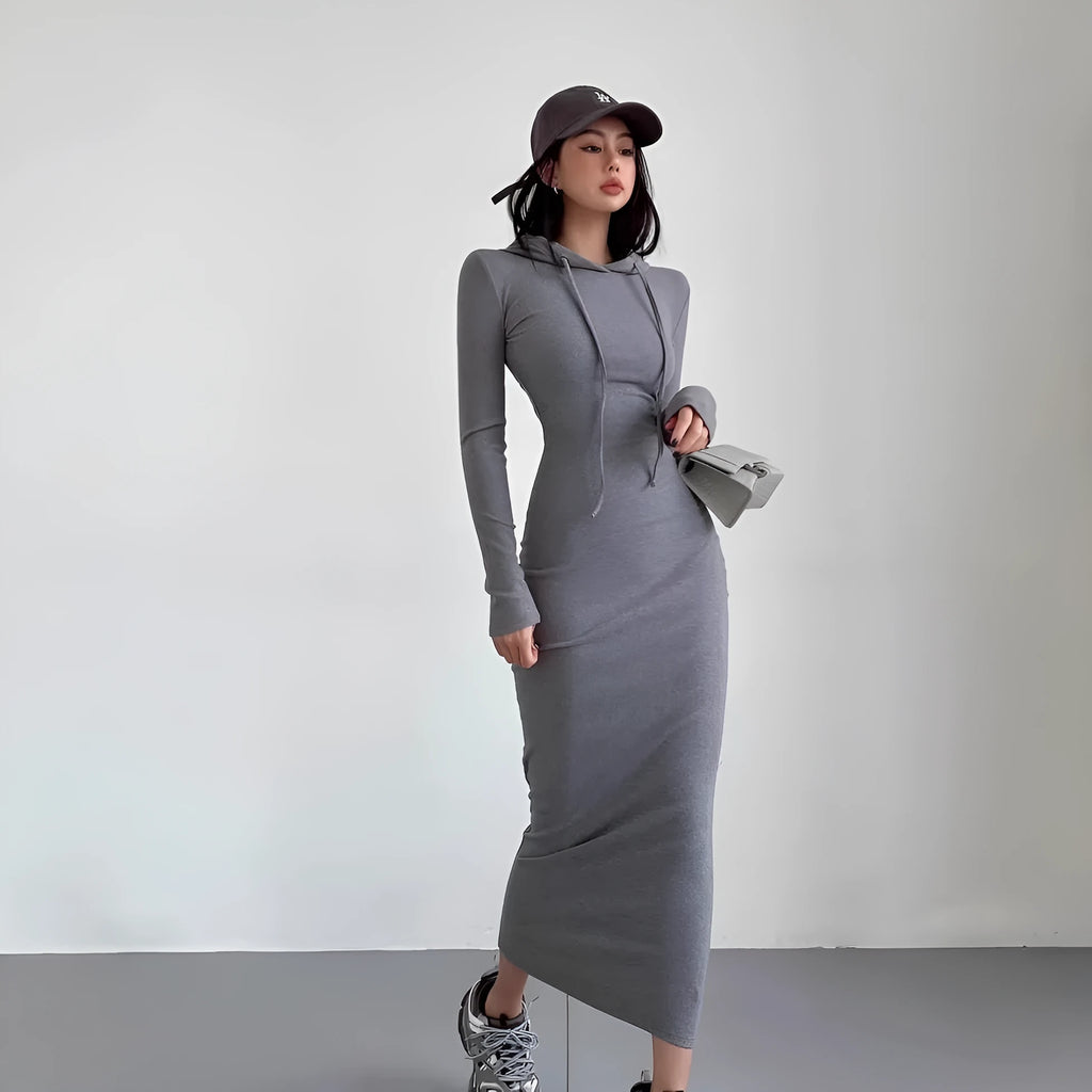 Women's grey hooded long sleeve sheath dress with a high waist on a model.