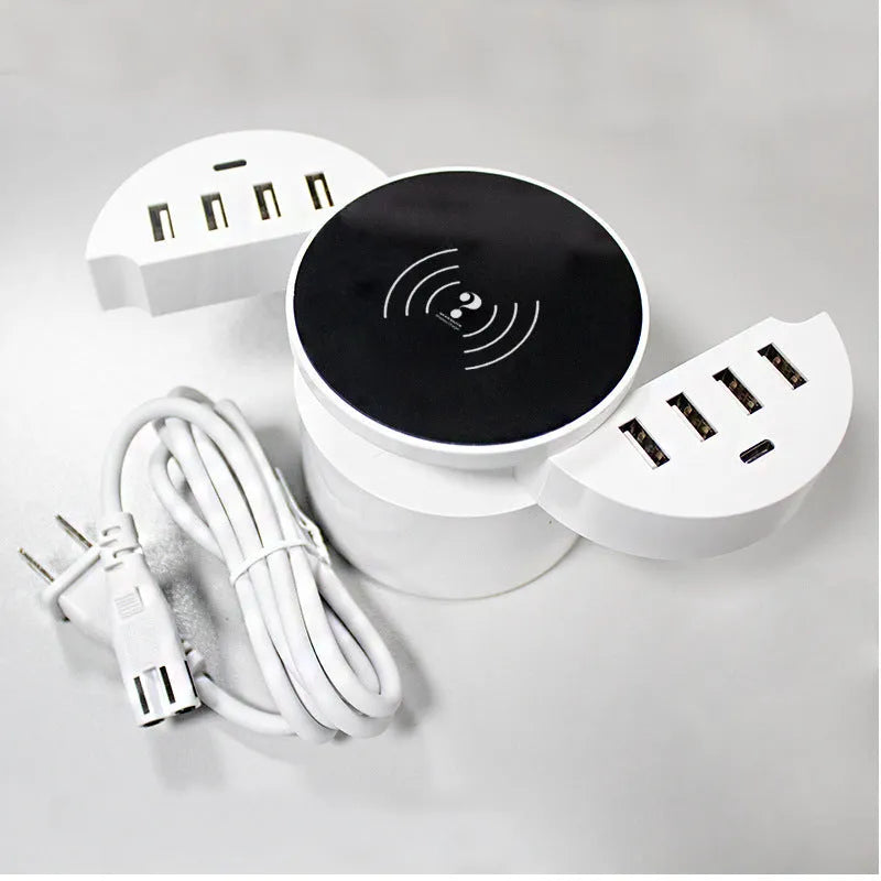 Ceramic white circular wireless charger with multiple ports and international adapters for smartphone charging