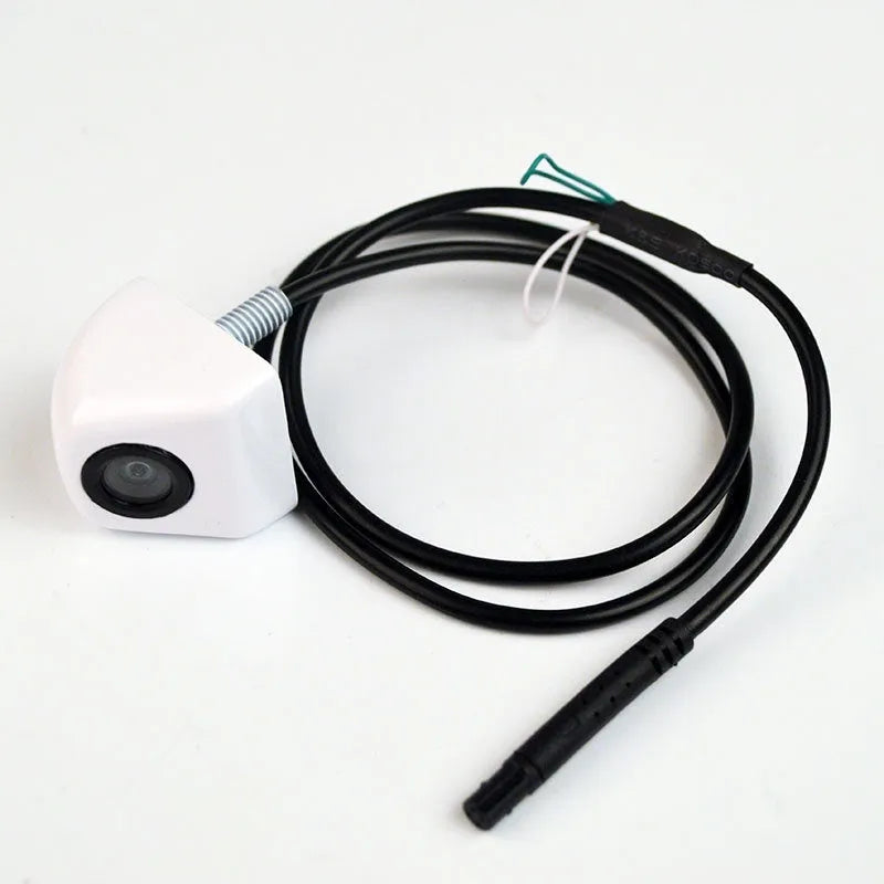 Black metal waterproof car rearview camera with lens and integrated cable for parking assistance.