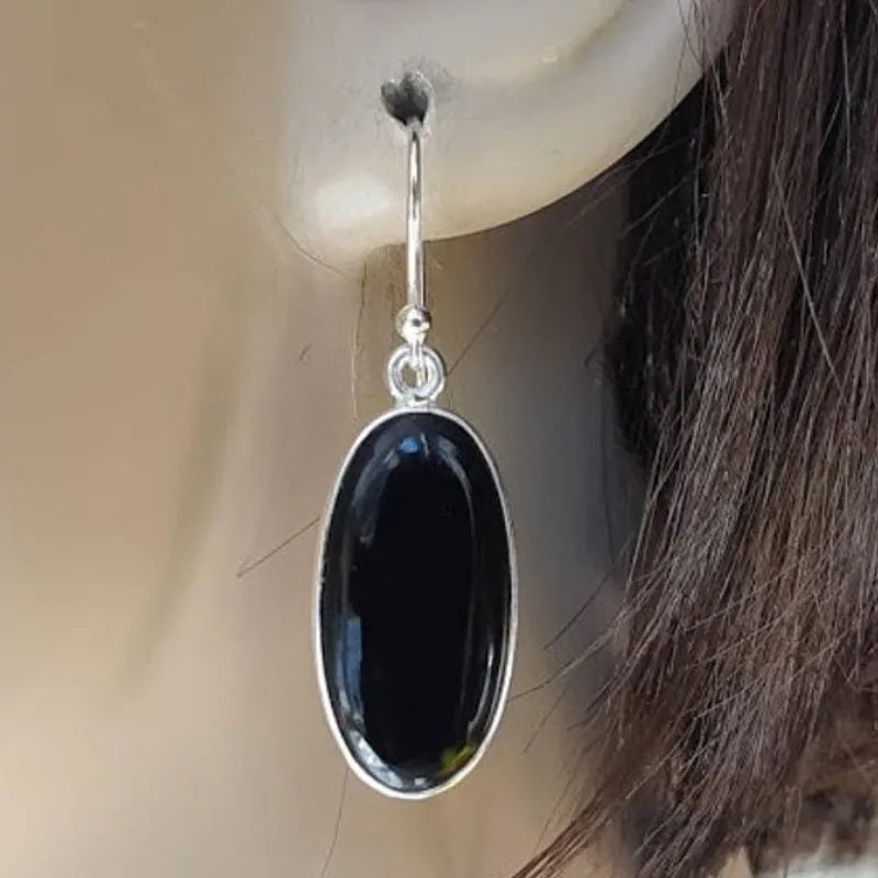Women's fusion style earrings with oval black agate pendant in electroplated 925 silver geometric setting